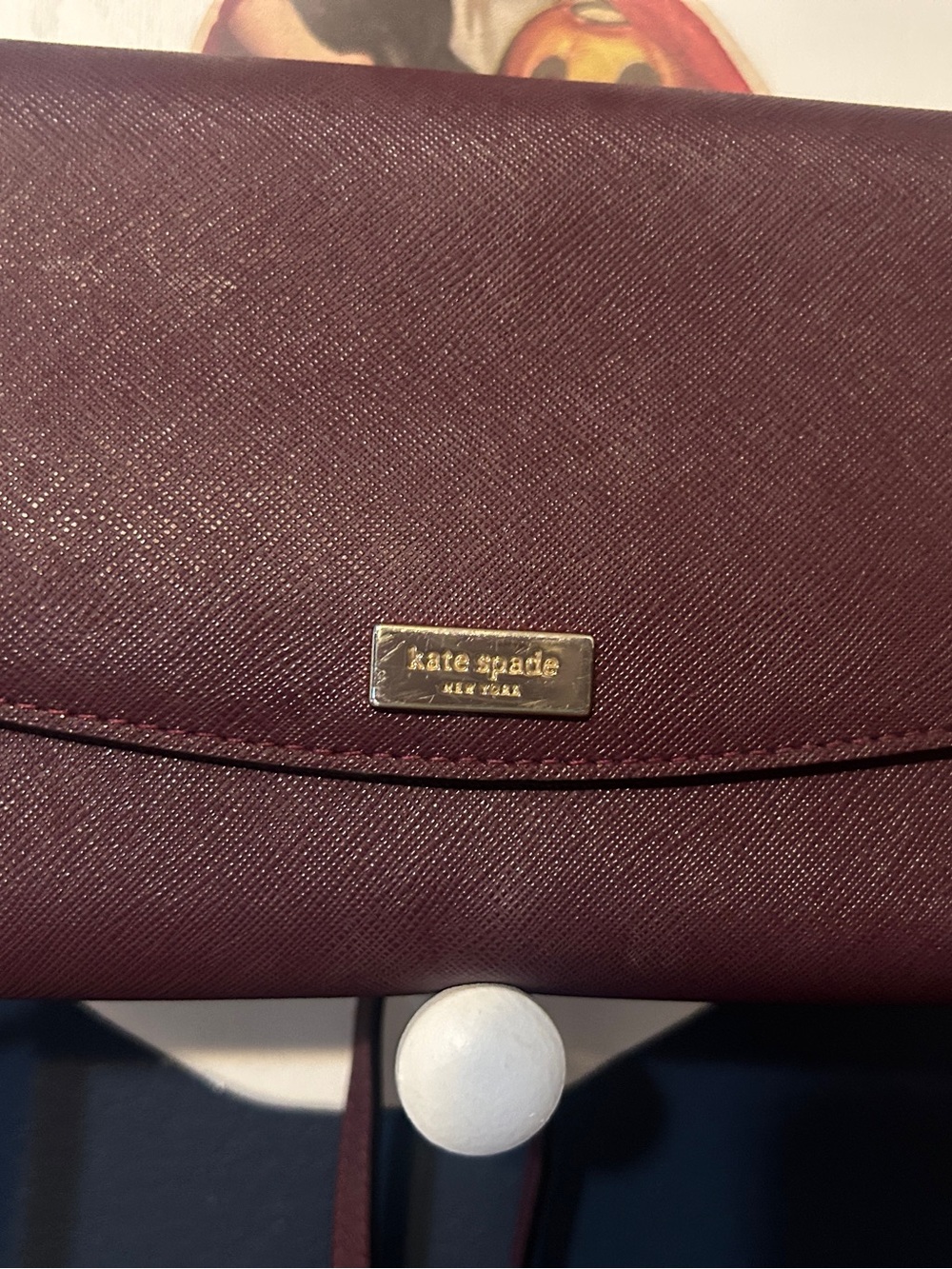 kate spade burgundy leather crossbody with gold plaque